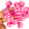 Laço Duplo em X Corações Rosa